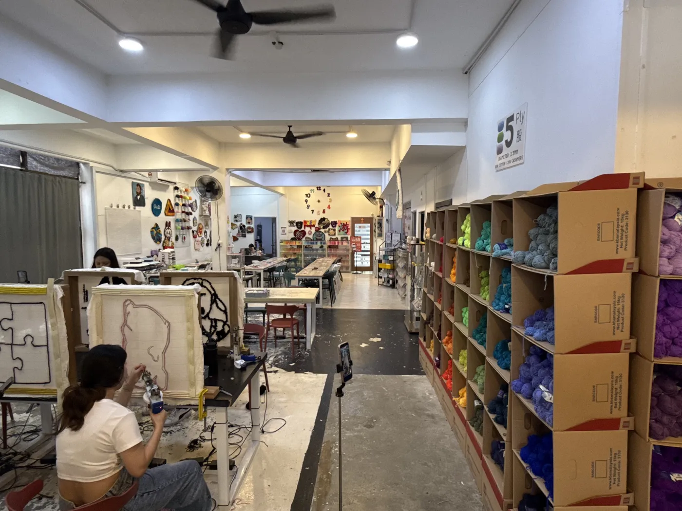 Shelves inside the YooArtLife studio and shop in Cheras